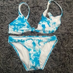 White and blue bathing suit, size small, never worn
